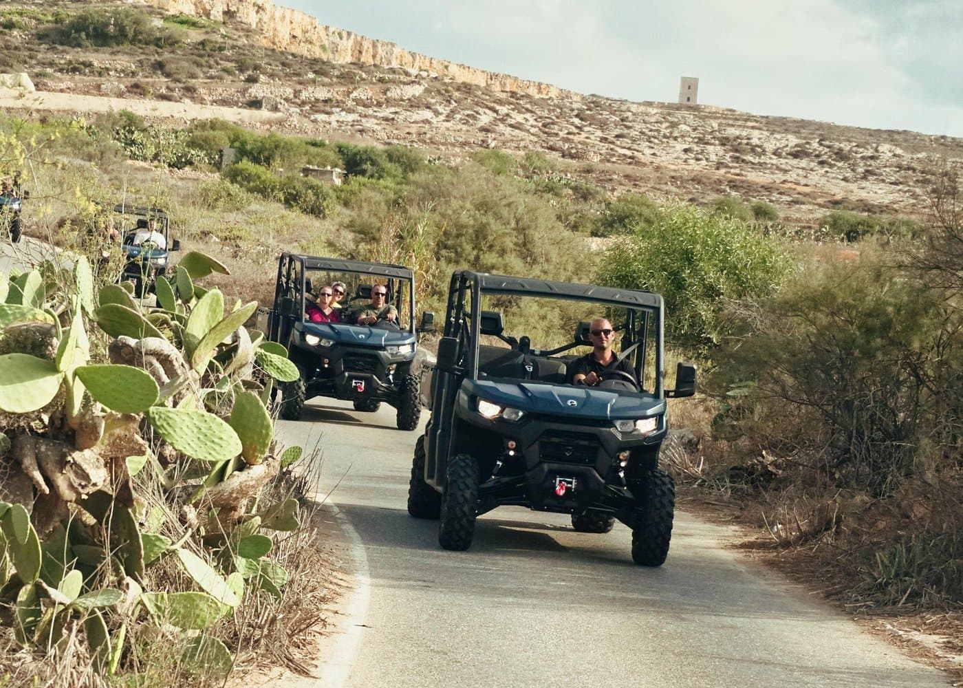 Open 6-seater UTV on a Gozo coastal track.