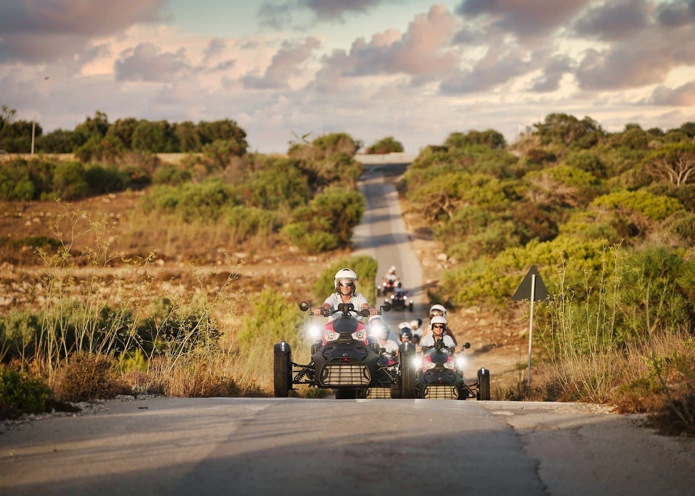 Can-Am Ryker three-wheeler on a Gozo road at sunset.
