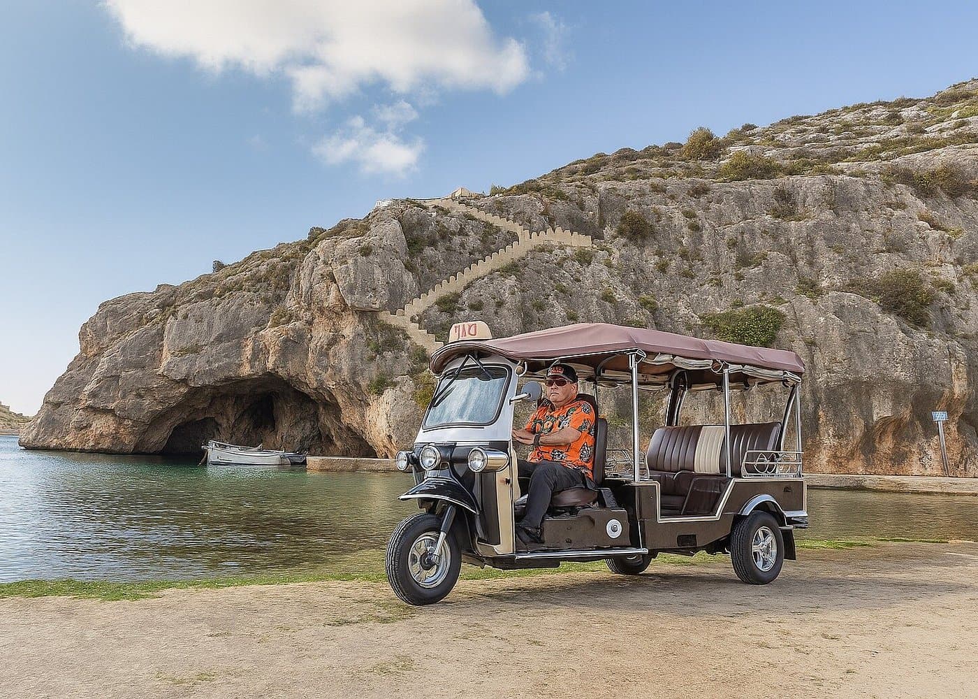 Comino cruise before a Gozo sunset tuk tuk.