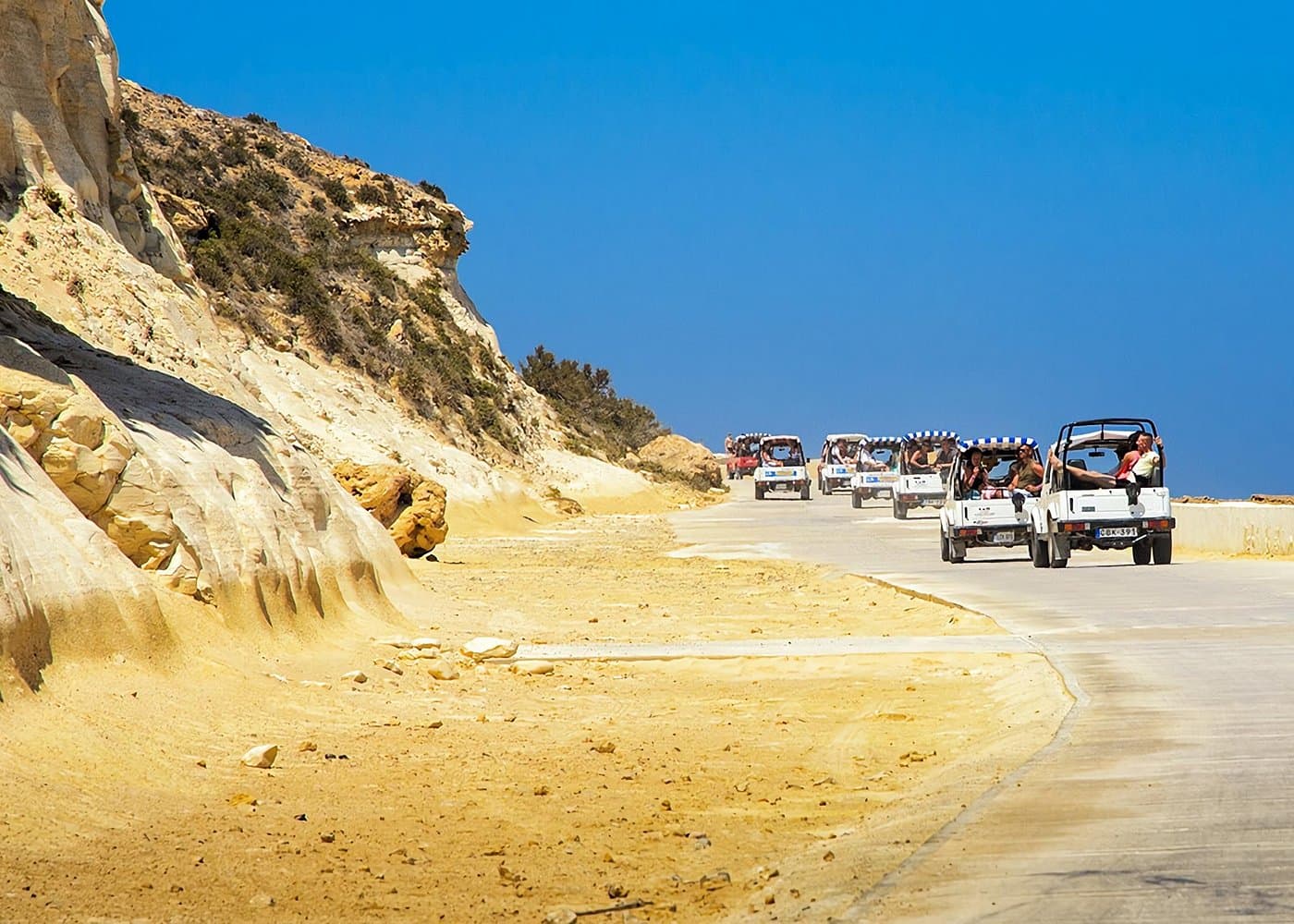 Arrigo jeep tour leaving Mġarr Harbour with a driver-guide.