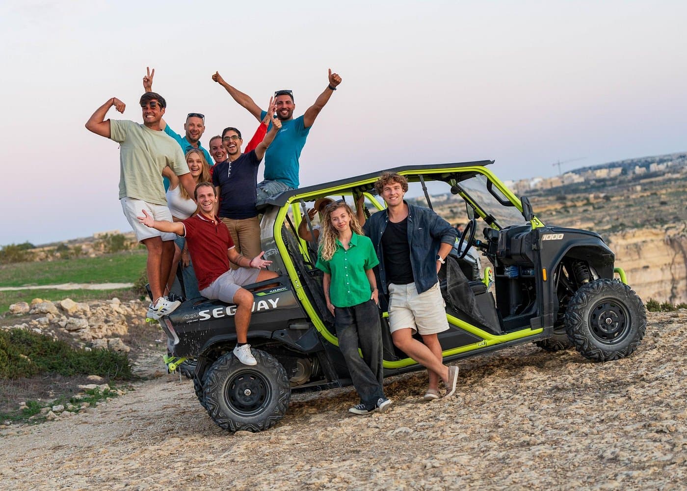 Group with an open 4x4 after a Gozo island loop.